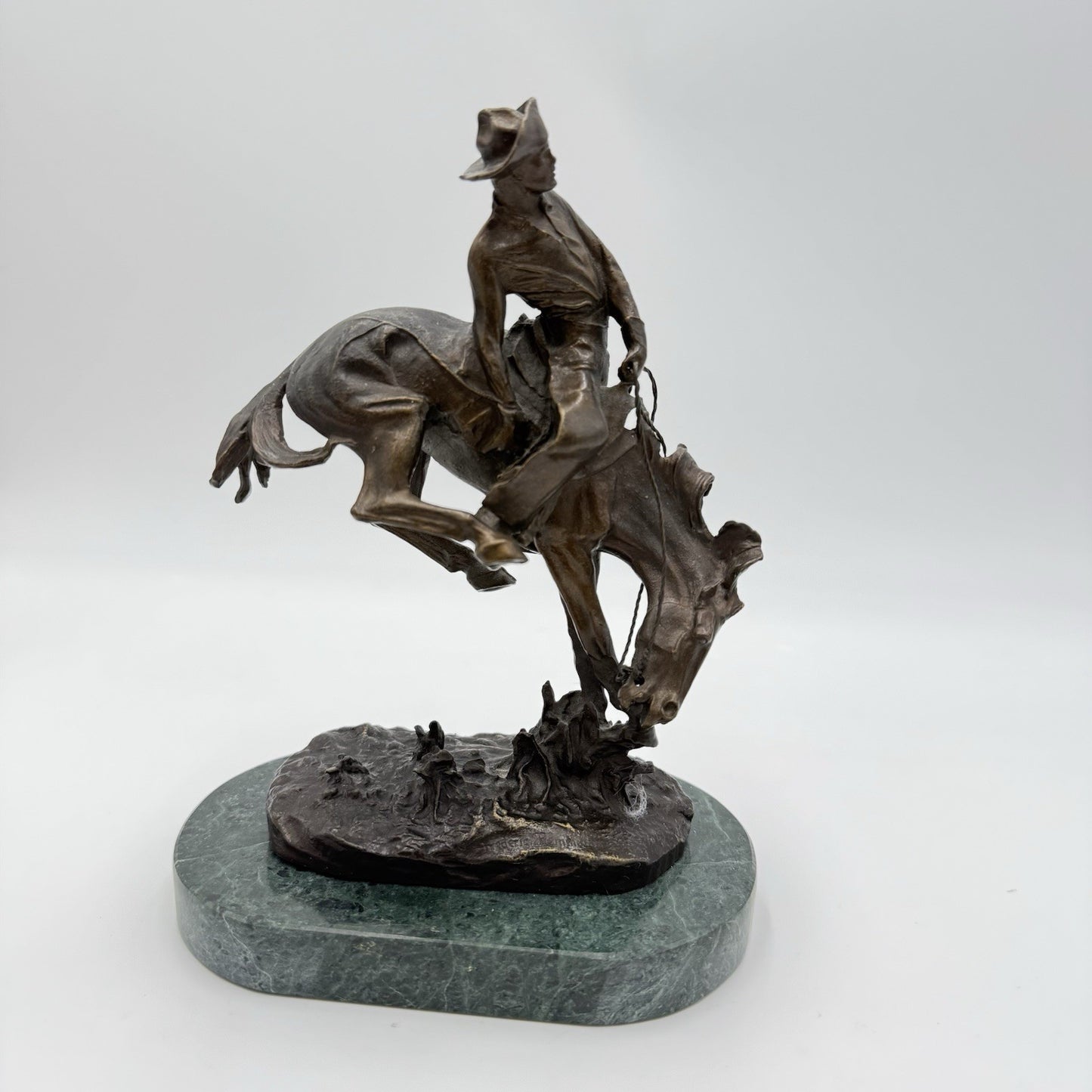 After Frederic Remington patinated bronze sculpture Outlaw Marble Base 8”