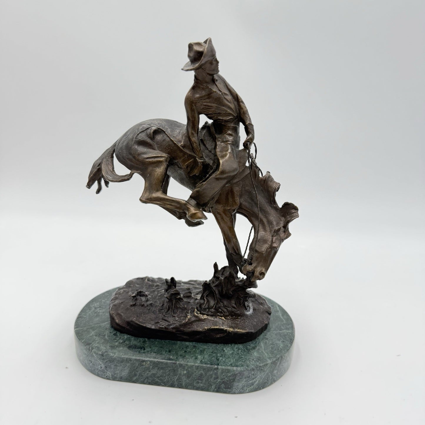 After Frederic Remington patinated bronze sculpture Outlaw Marble Base 8”