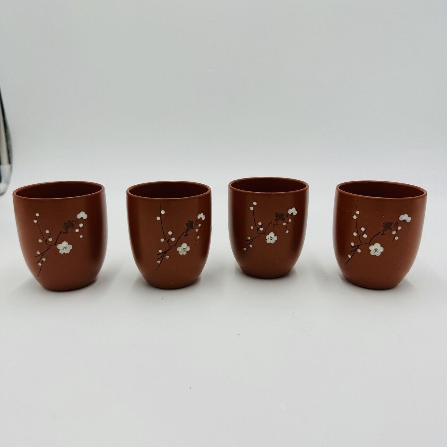 Yizing zisha zhu terracota plum floral tea cups set Signed 4 Pieces