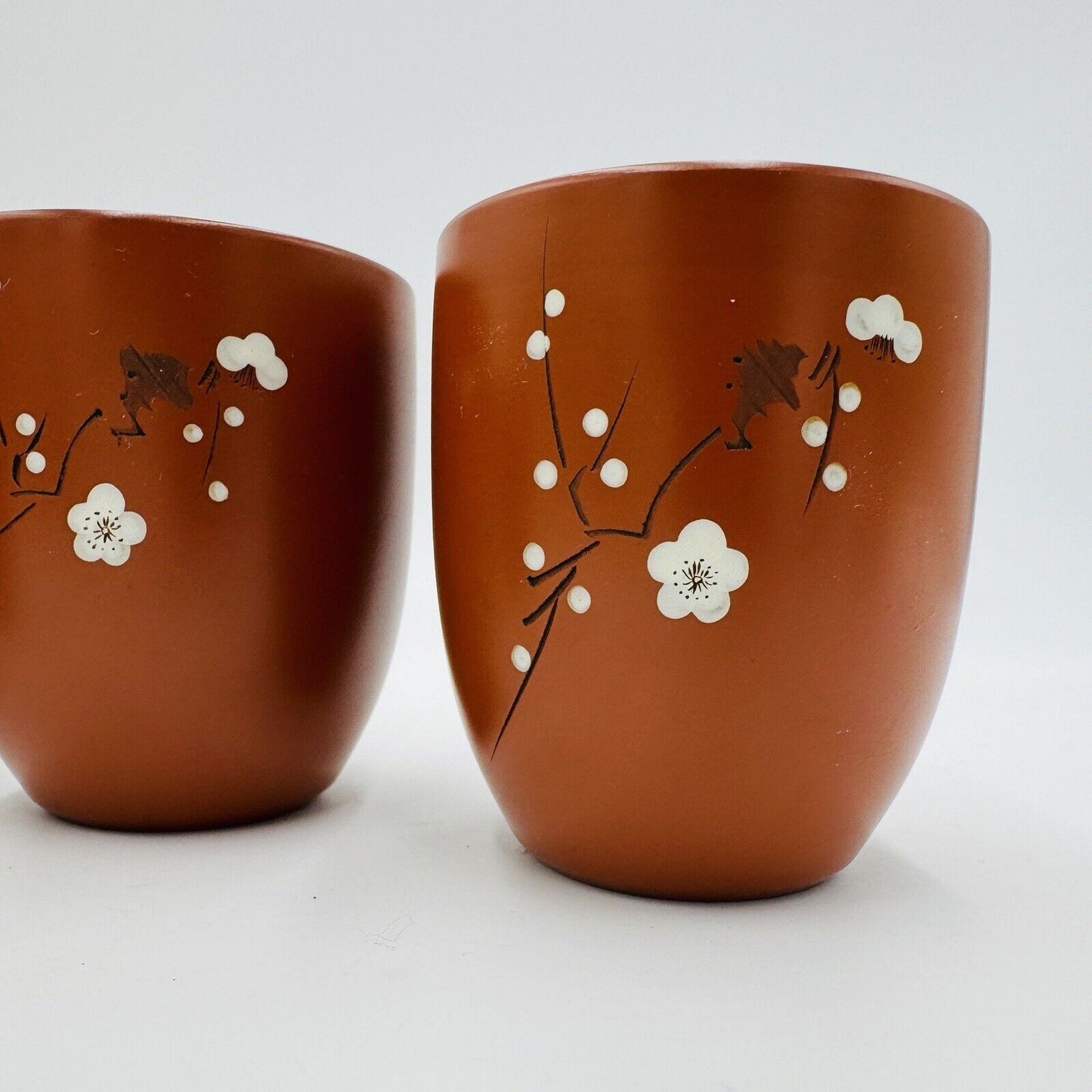 Yizing zisha zhu terracota plum floral tea cups set Signed 4 Pieces