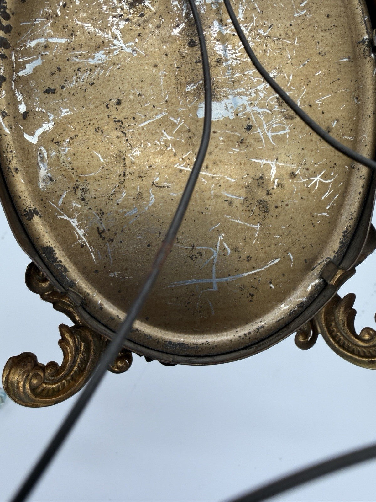 Antique oval picture frame ornate brass scrolling top ribbon accent