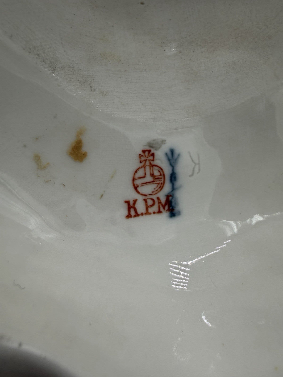 Rare 19th C KPM Berlin Rocaille porcelain candelabra kneeling reading putto 14”