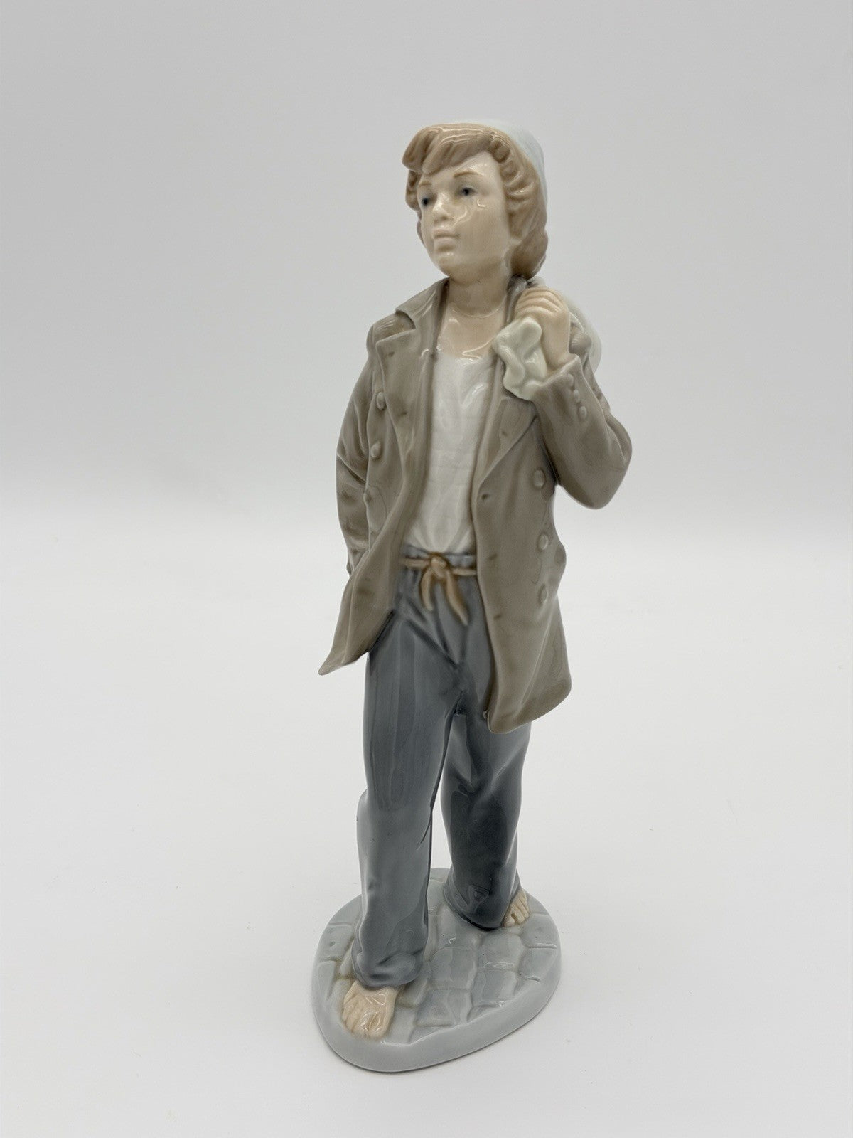 NAO by Lladro  Spain 9" Barefoot Boy With Knapsack Ship Boy Figurine