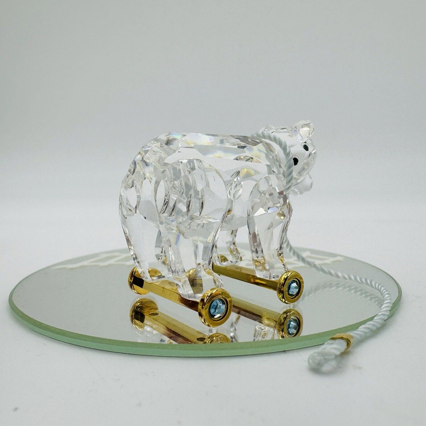 Swarovski Crystal Austria bear On Wheels Figurine Gold Pull Rope