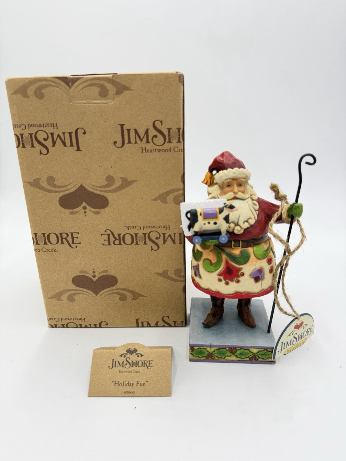 Jim Shore Heartwood Creek Holiday Fun 2008 Santa With Toy Cow Figurine
