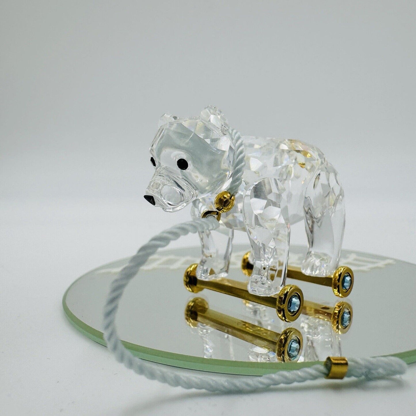 Swarovski Crystal Austria bear On Wheels Figurine Gold Pull Rope