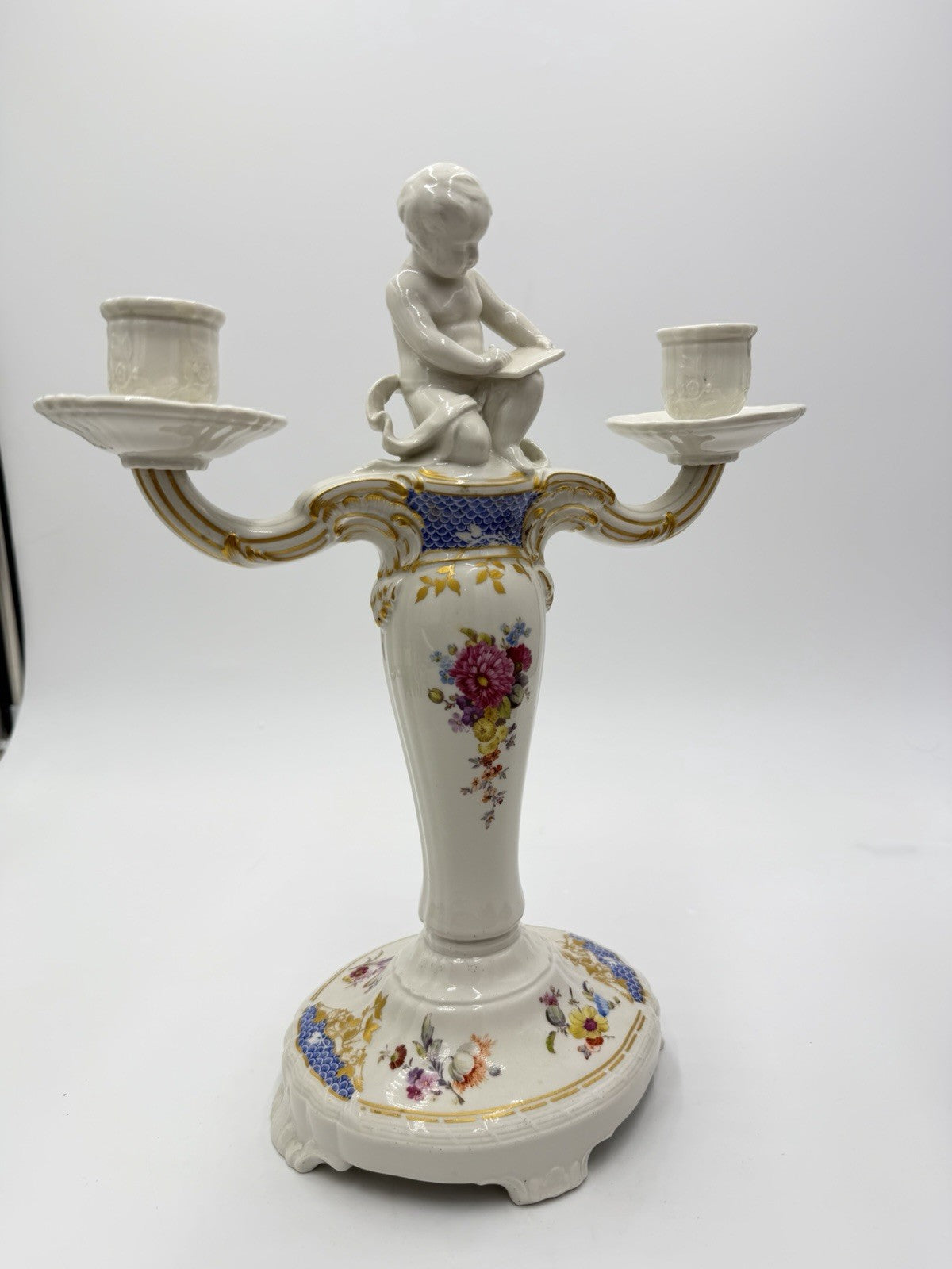 Rare 19th C KPM Berlin Rocaille porcelain candelabra kneeling reading putto 14”