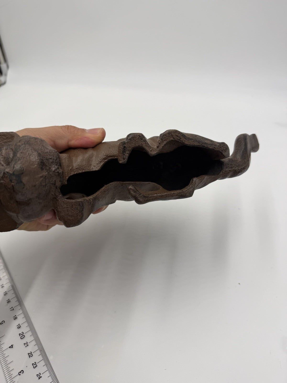 vintage cast iron cat shelf sitter with a rustic antique brown finish 10”Lx4”H