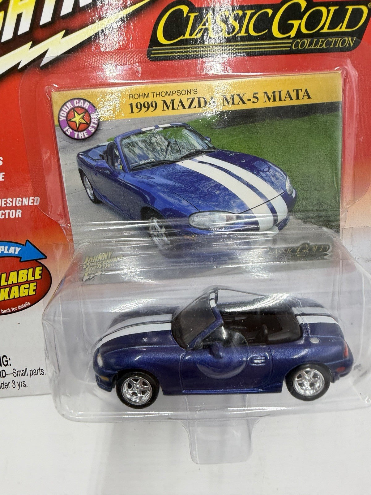 Johnny Lightning Classic Gold Rohm Thompson's 1999 Mazda MX-5 Miata Sealed