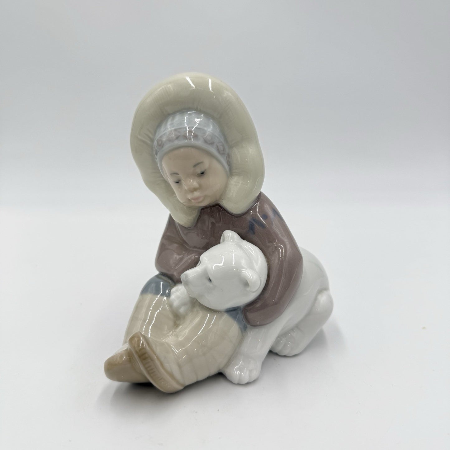 LLADRO Spain Porcelain Eskimo Inuit Boy playing  With Polar Bear Cub Figurine
