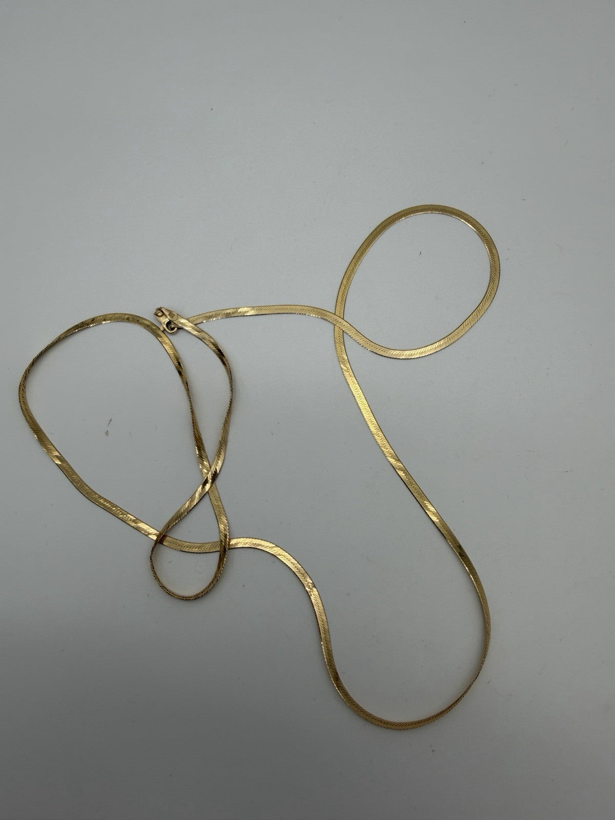 14K yellow gold herringbone necklace 6.76g Long 30” Length 4mm