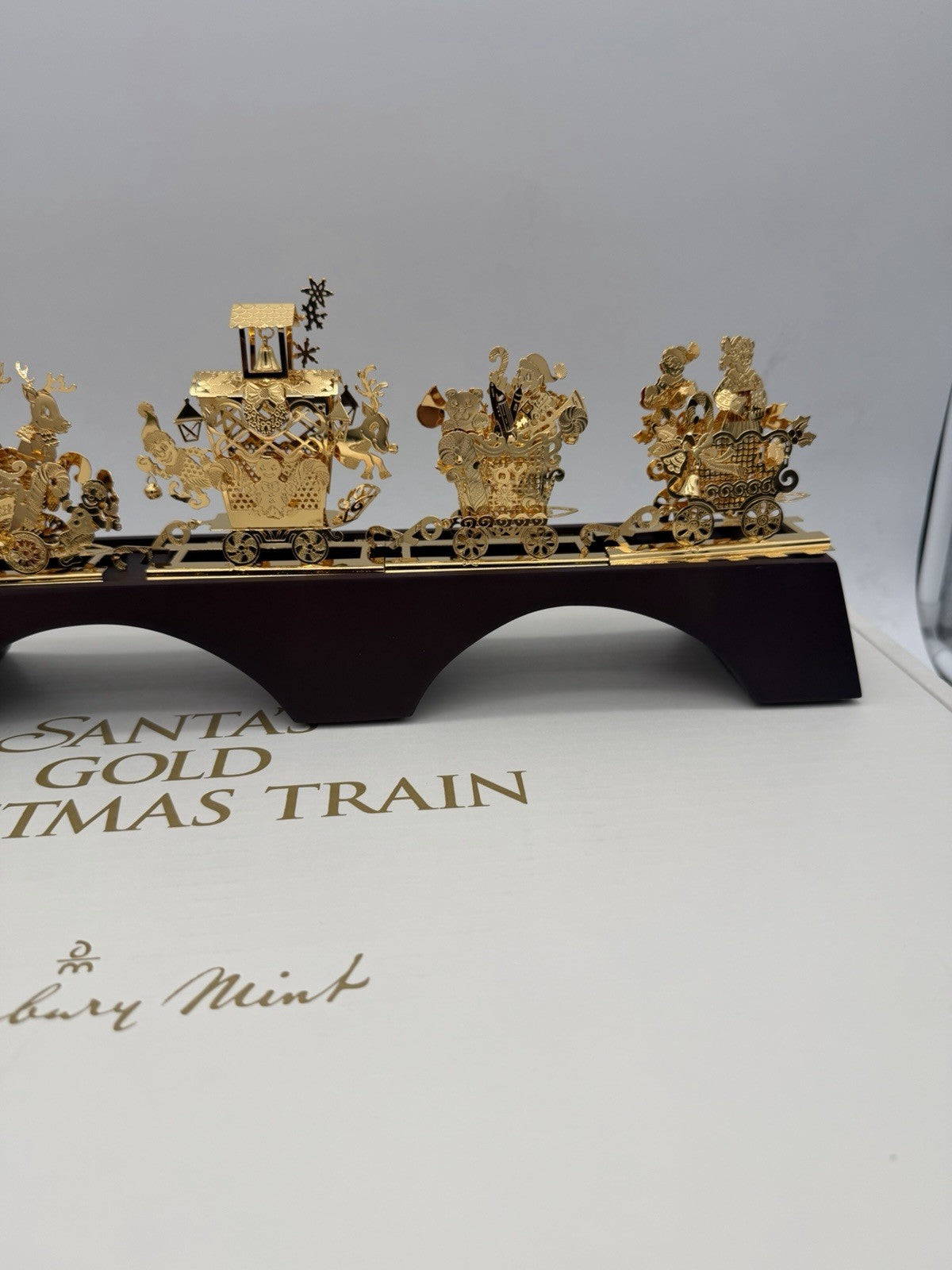 The Danbury Mint Santa’s Gold Christmas Train 24k Gold Finish Complete Wood Base