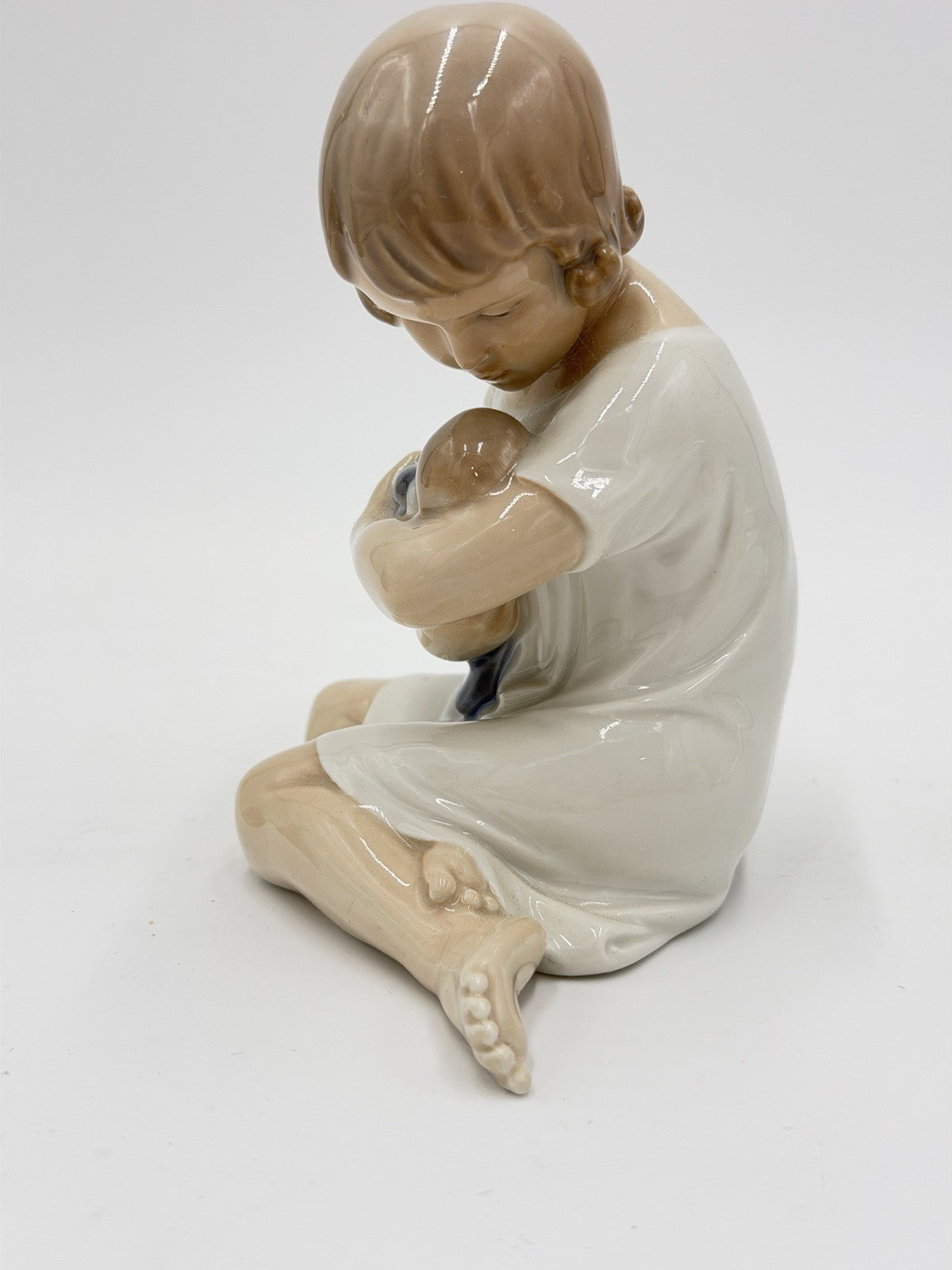 Royal Copenhagen Denmark Porcelain Figurine Girl Cradling Doll 5.25" M.1938