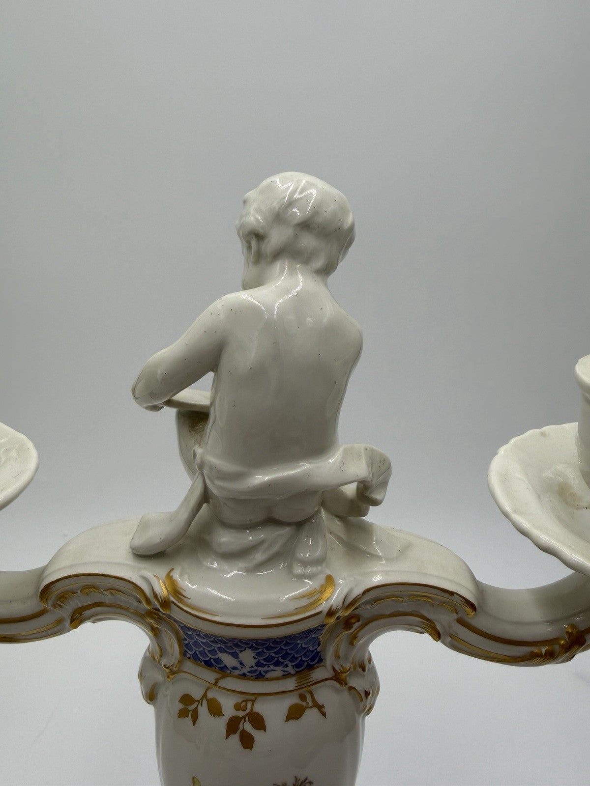 Rare 19th C KPM Berlin Rocaille porcelain candelabra kneeling reading putto 14”