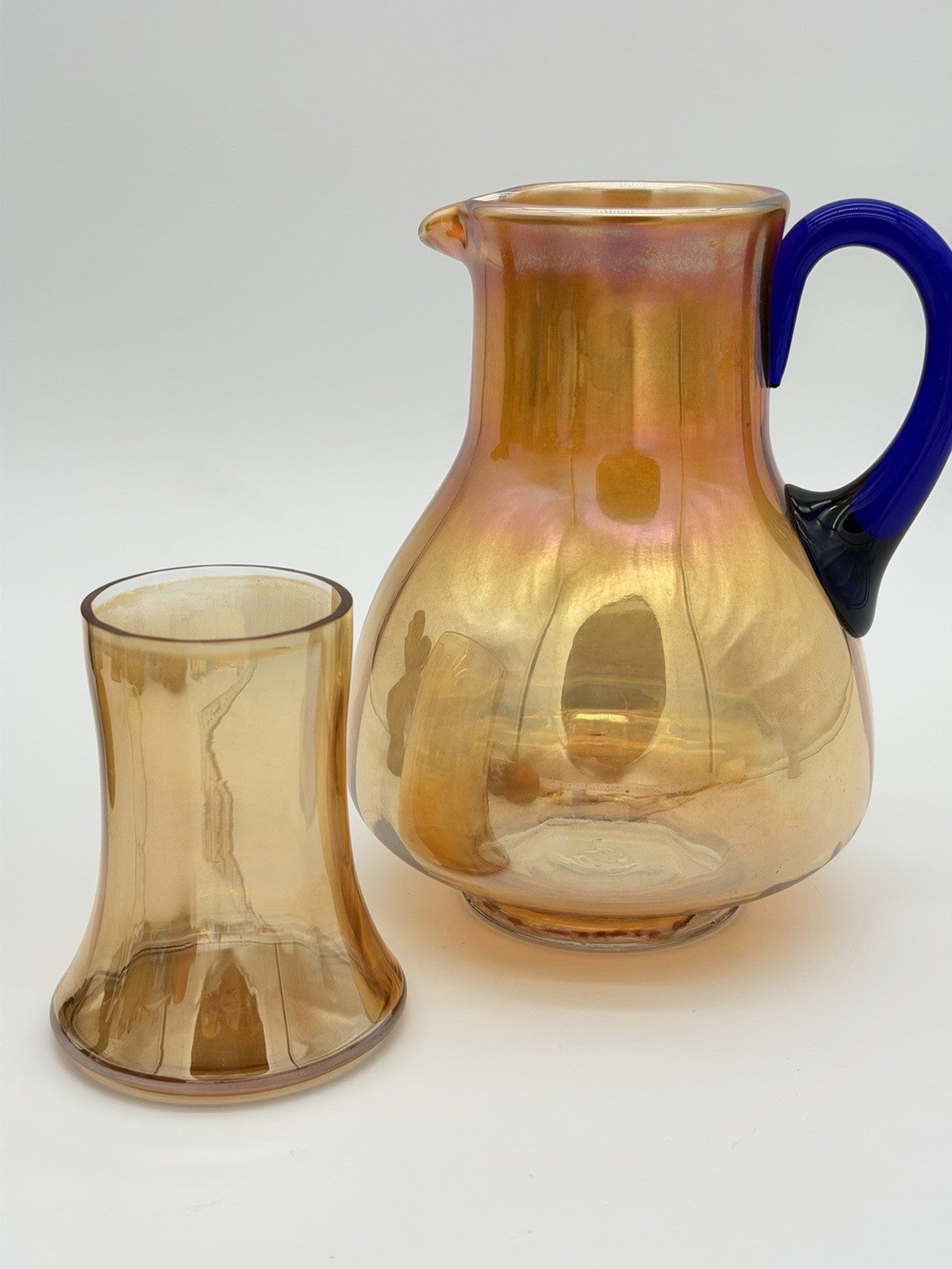Fenton Art Glass Guest Tumble Up carnival pitcher marigold cobalt blue handle
