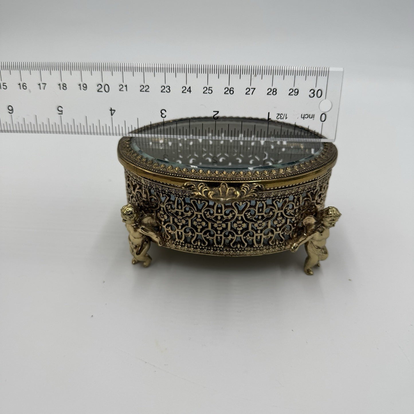 Vintage Gold Filigree Oval Ormolu casket Hollywood Regency style Cherubs Footed
