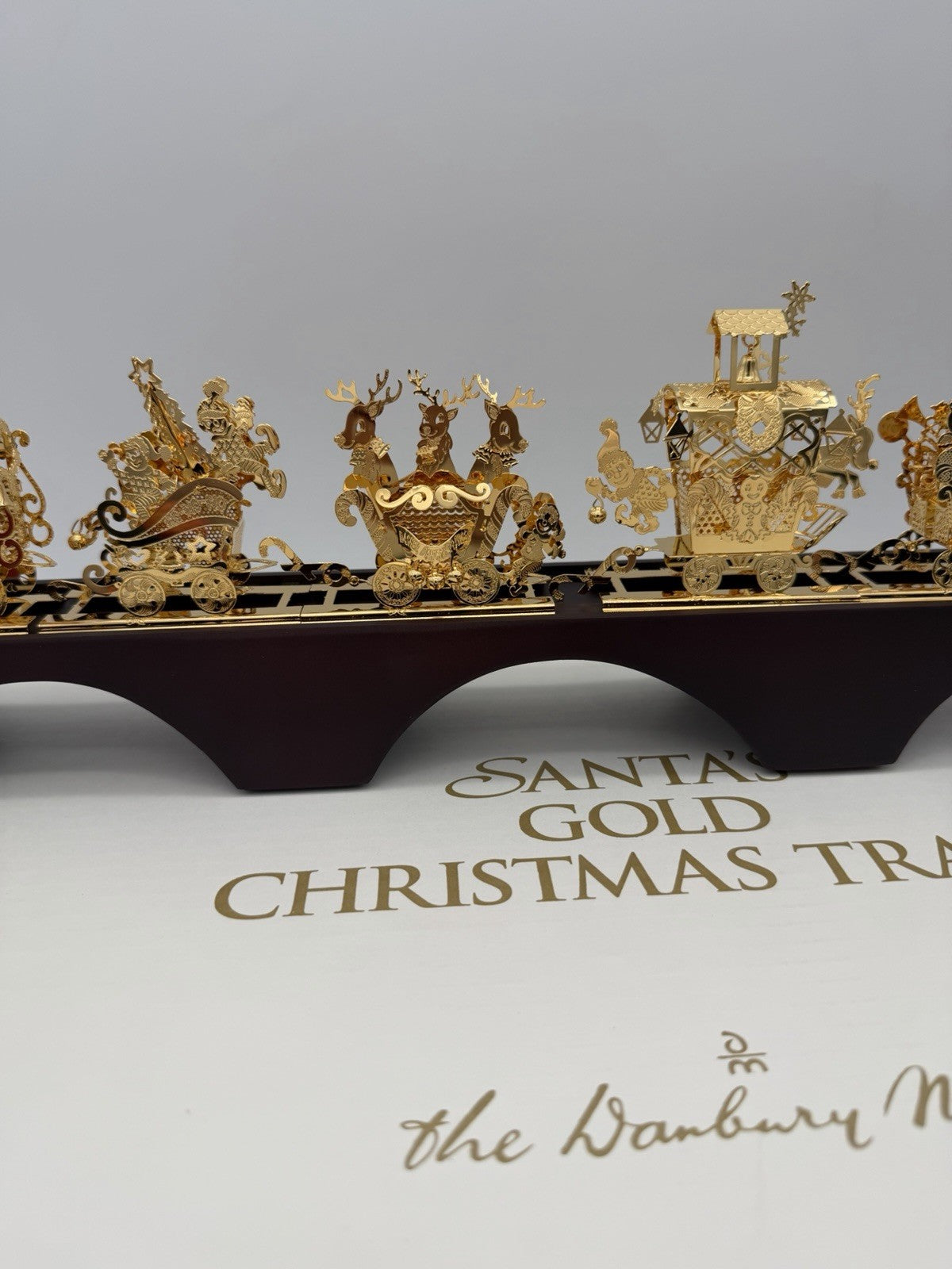 The Danbury Mint Santa’s Gold Christmas Train 24k Gold Finish Complete Wood Base