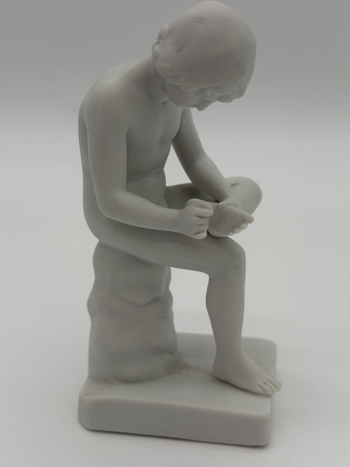 Antique parian ware seated boy Spinario Boy w/ Thorn white bisque 4” figurine