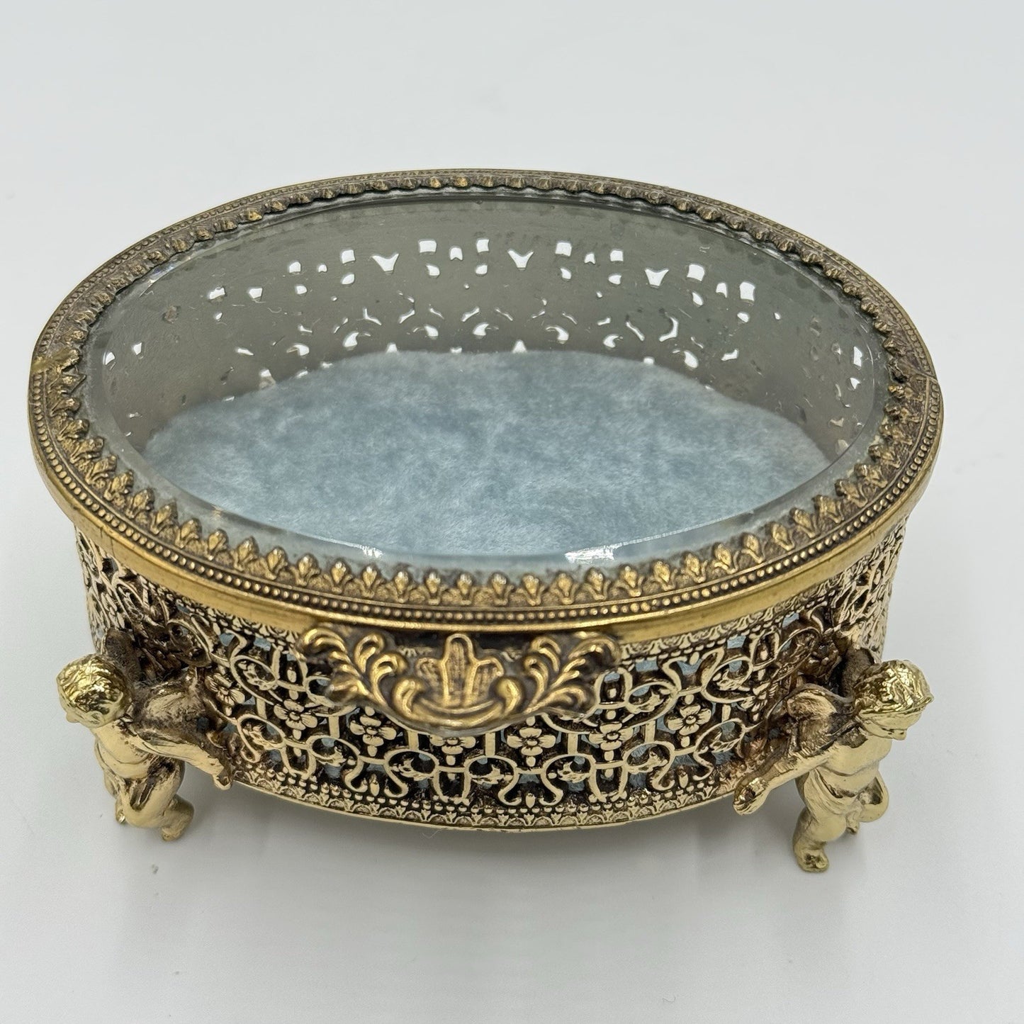 Vintage Gold Filigree Oval Ormolu casket Hollywood Regency style Cherubs Footed