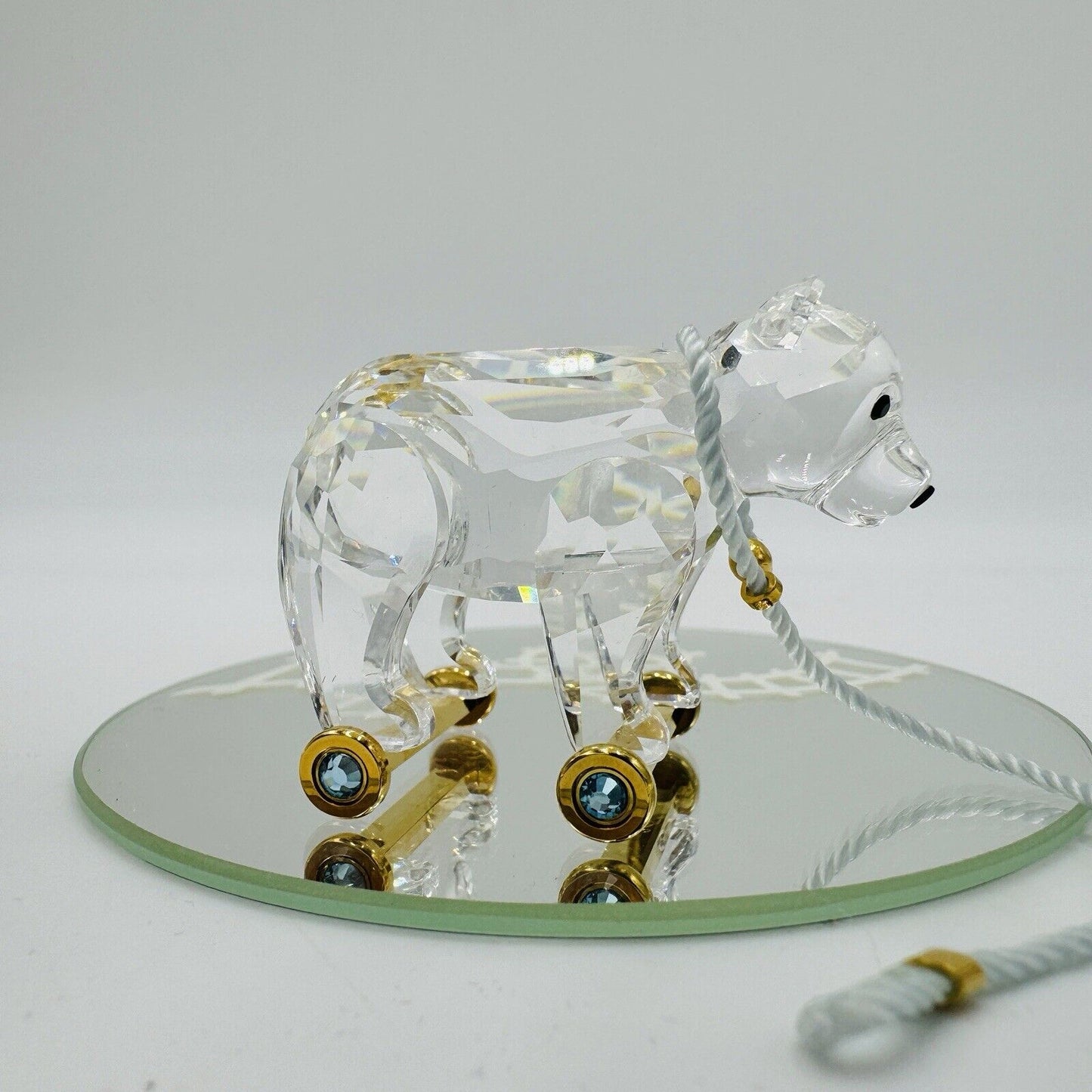 Swarovski Crystal Austria bear On Wheels Figurine Gold Pull Rope