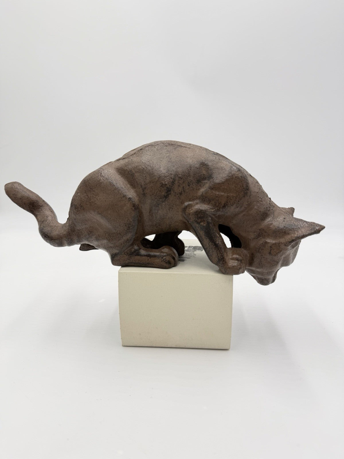 vintage cast iron cat shelf sitter with a rustic antique brown finish 10”Lx4”H