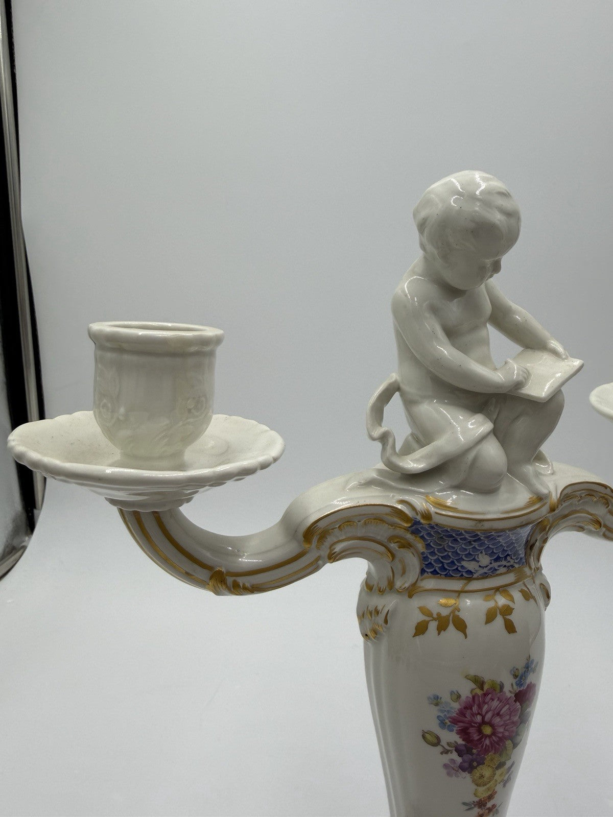 Rare 19th C KPM Berlin Rocaille porcelain candelabra kneeling reading putto 14”