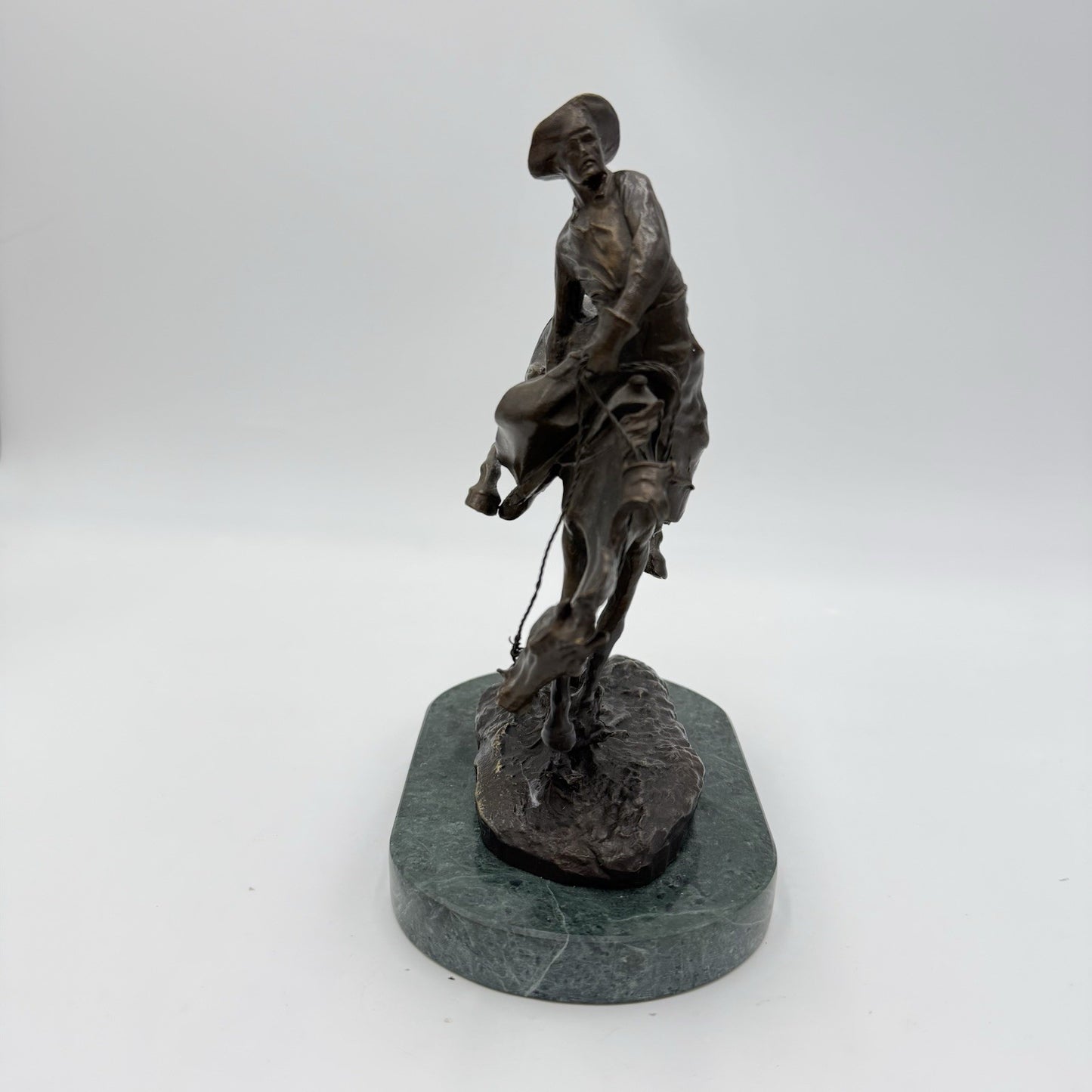 After Frederic Remington patinated bronze sculpture Outlaw Marble Base 8in