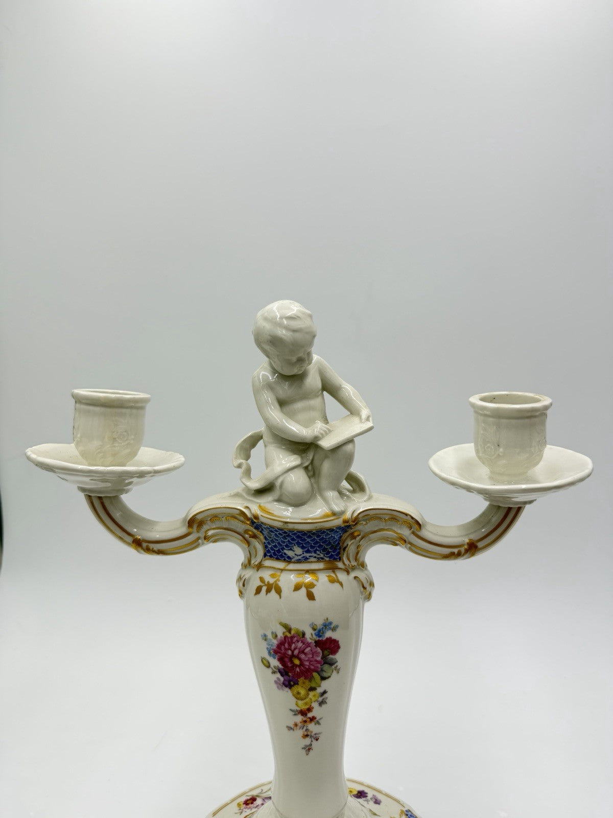 Rare 19th C KPM Berlin Rocaille porcelain candelabra kneeling reading putto 14”