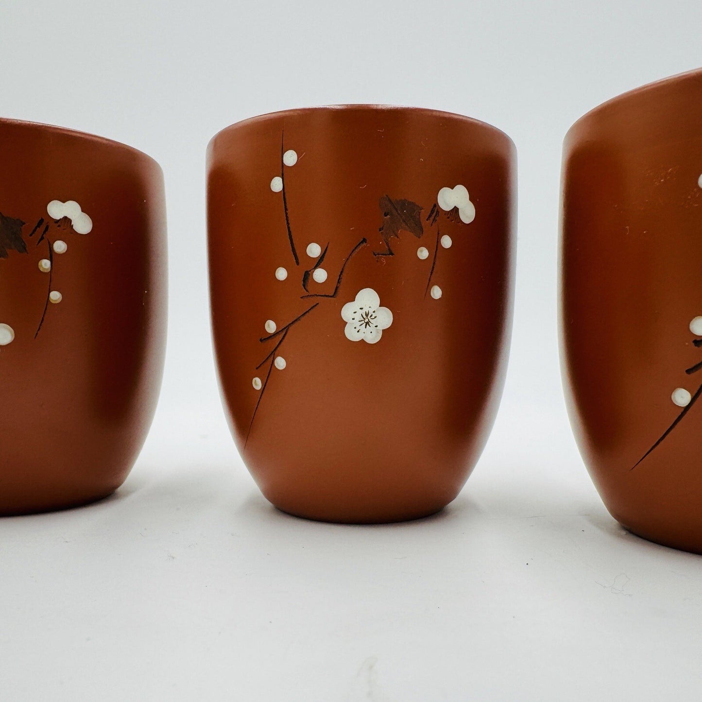 Yizing Zisha Zhu Terracota Plum Floral Tea Cups Set Signed 4 Pieces