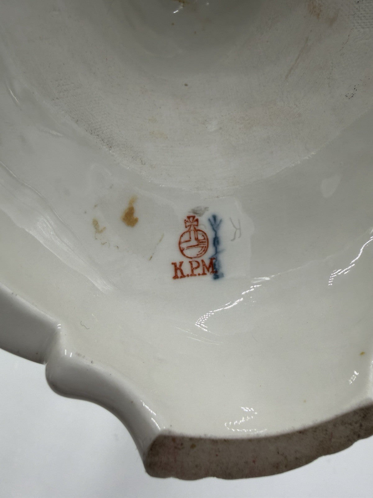 Rare 19th C KPM Berlin Rocaille porcelain candelabra kneeling reading putto 14”