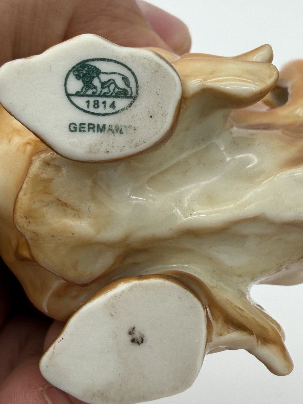 Hutschenreuther Porcelain Germany pekinese Dog Glossy Painted Figurine Brown