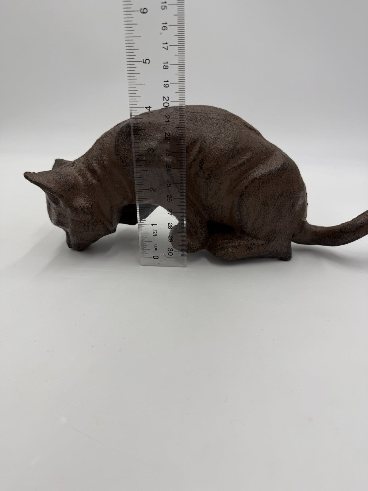 vintage cast iron cat shelf sitter with a rustic antique brown finish 10”Lx4”H