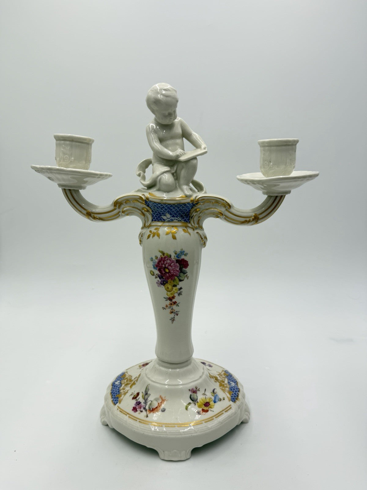 Rare 19th C KPM Berlin Rocaille porcelain candelabra kneeling reading putto 14”