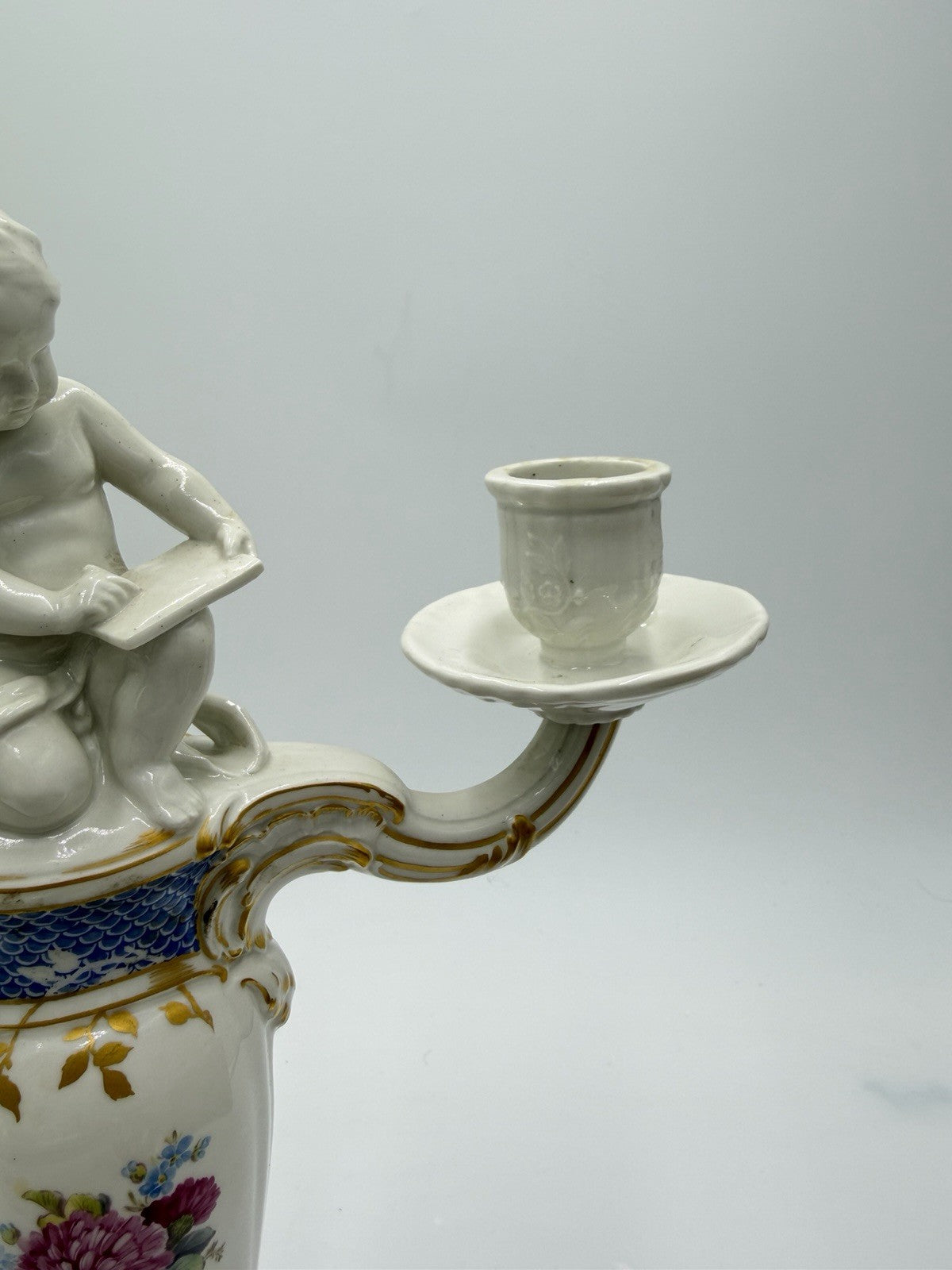 Rare 19th C KPM Berlin Rocaille porcelain candelabra kneeling reading putto 14”