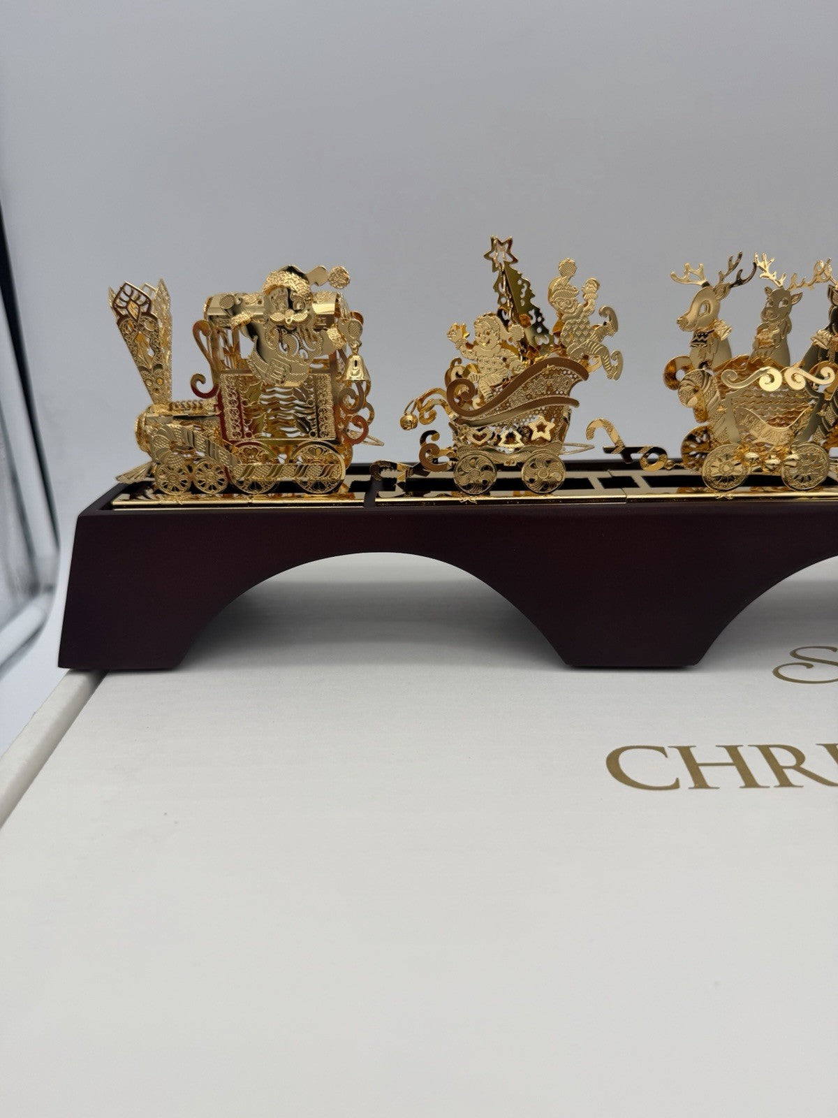 The Danbury Mint Santa’s Gold Christmas Train 24k Gold Finish Complete Wood Base