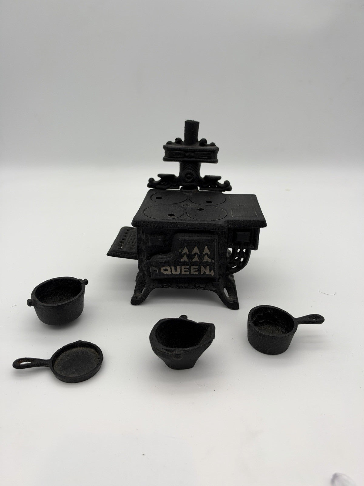 Vintage Queen Cast Iron Toy Cook Stove Oven w/ Mini Pots & Pans Set 1950
