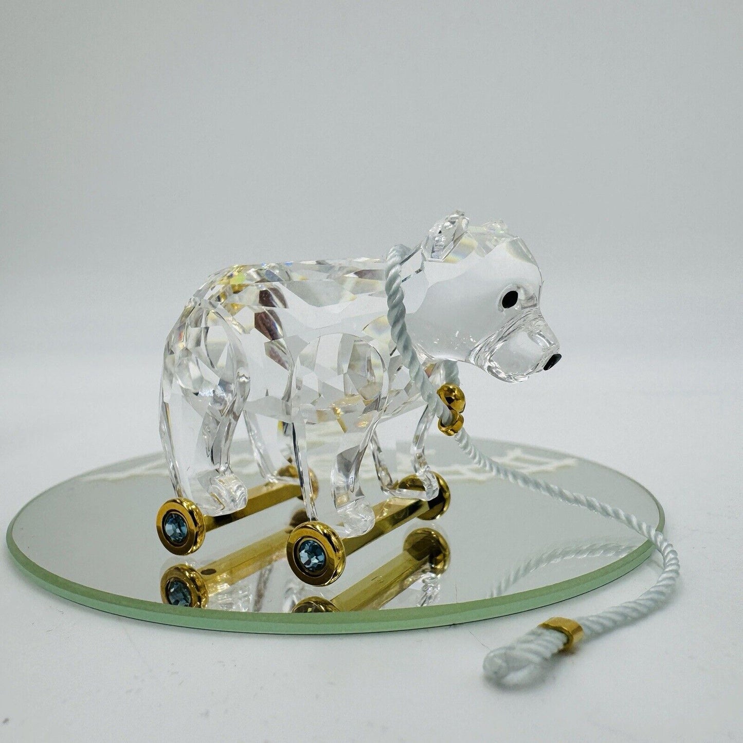 Swarovski Crystal Austria bear On Wheels Figurine Gold Pull Rope