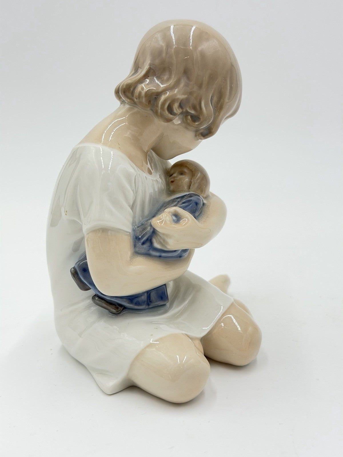Royal Copenhagen Denmark Porcelain Figurine Girl Cradling Doll 5.25" M.1938