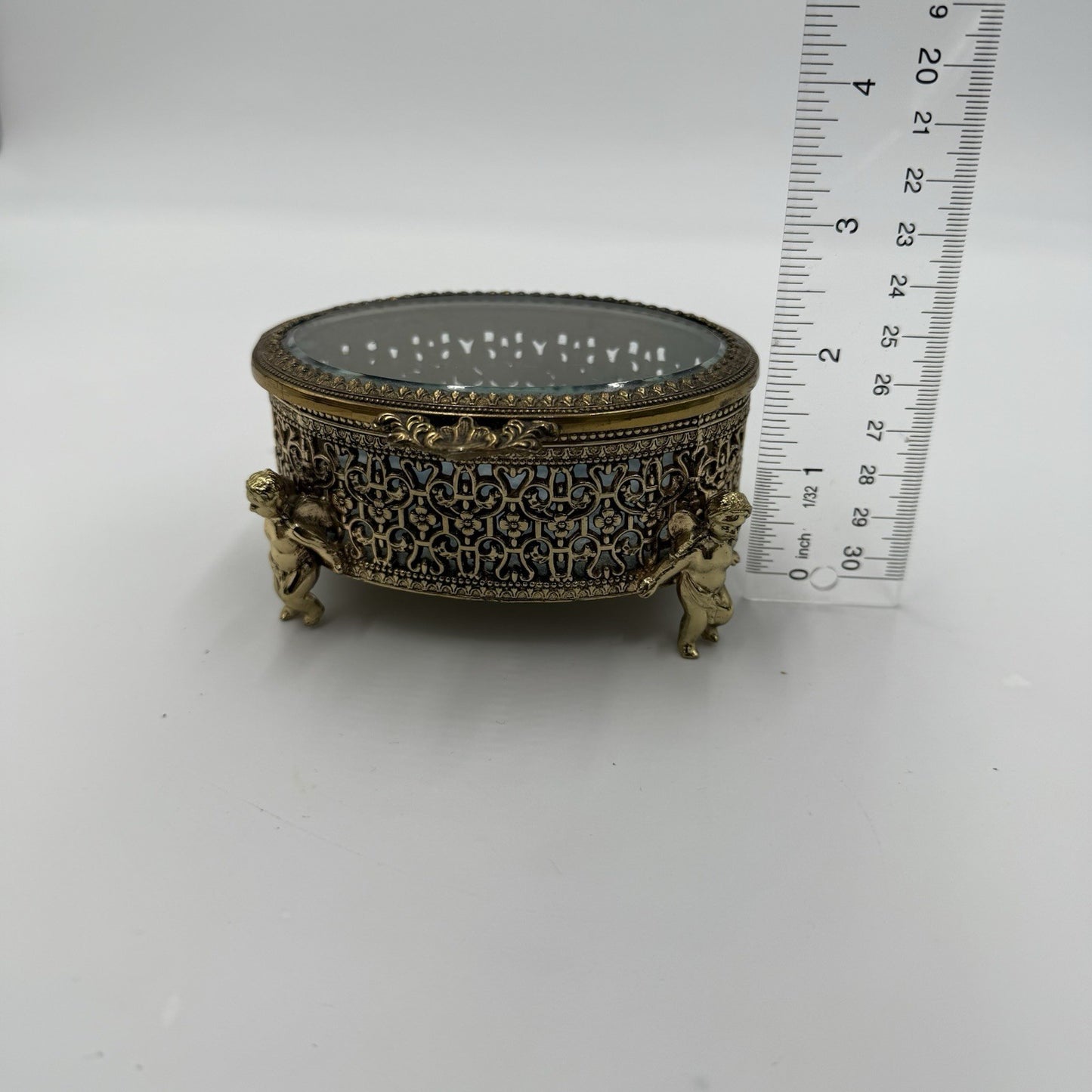 Vintage Gold Filigree Oval Ormolu casket Hollywood Regency style Cherubs Footed
