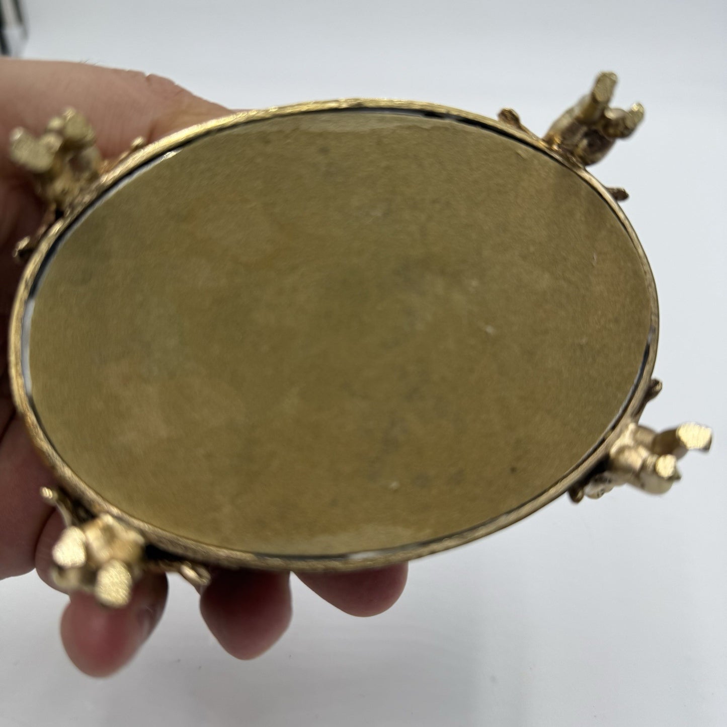 Vintage Gold Filigree Oval Ormolu casket Hollywood Regency style Cherubs Footed