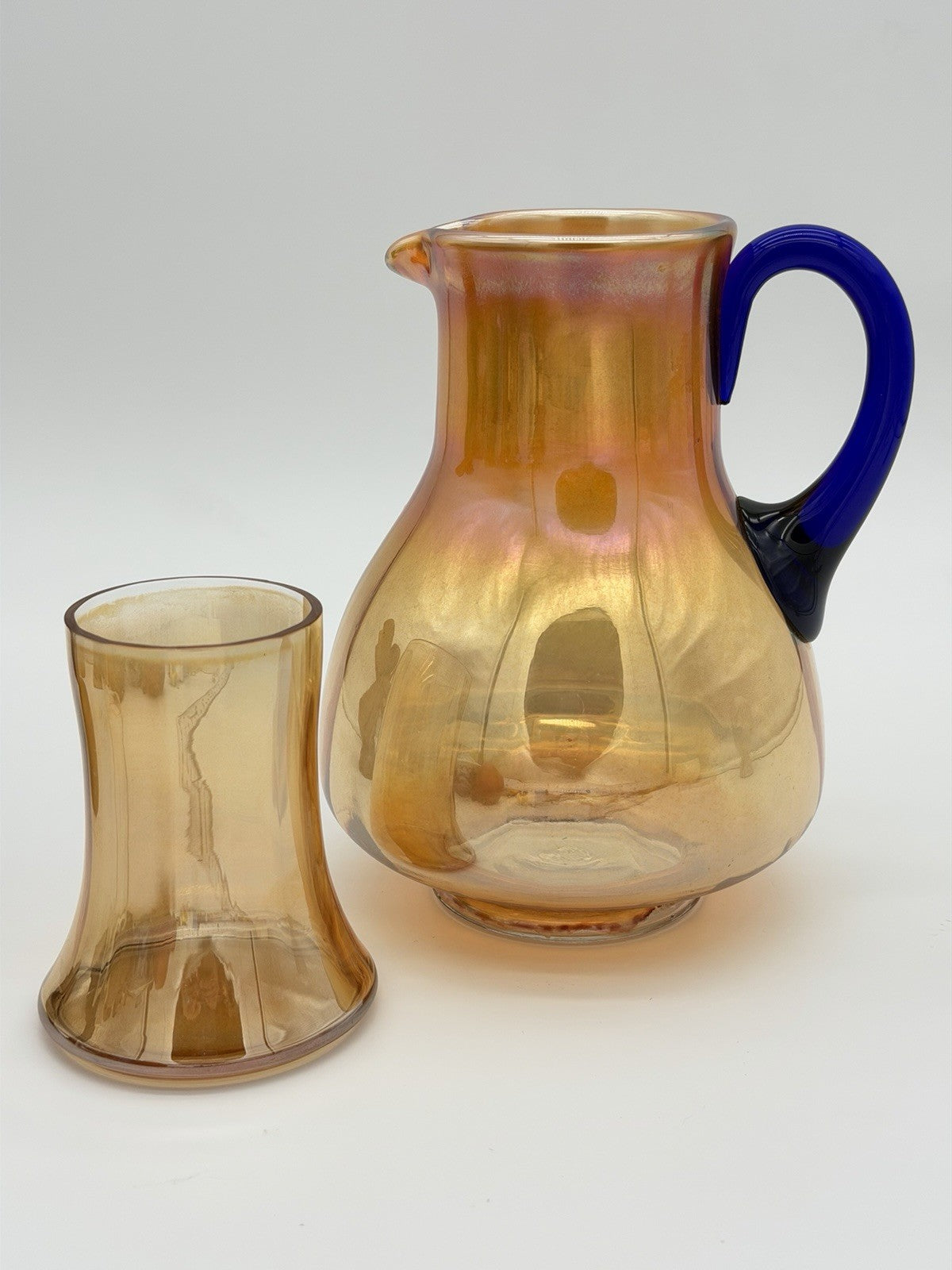 Fenton Art Glass Guest Tumble Up carnival pitcher marigold cobalt blue handle